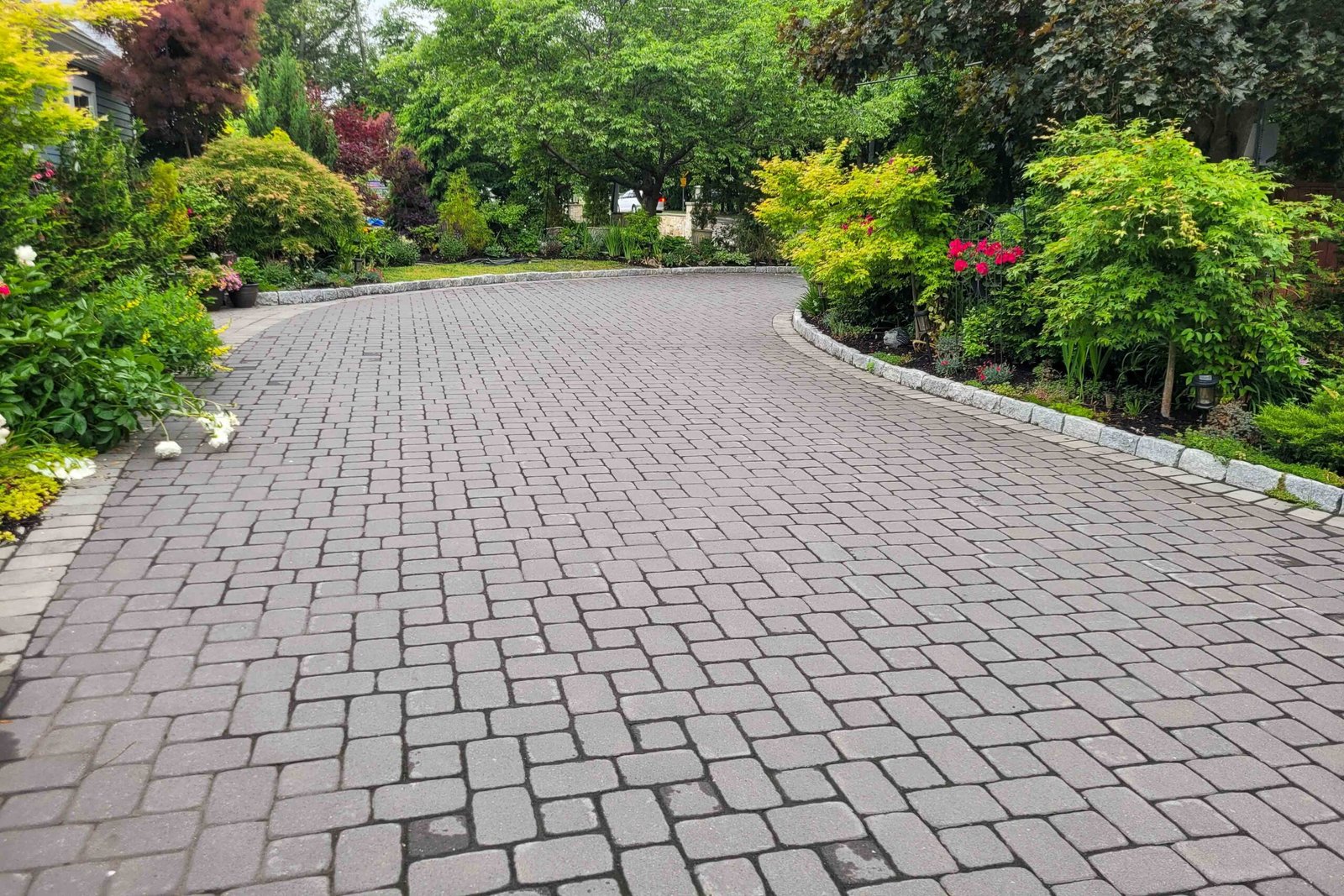 Photo of a driveway done with concrete pavers
